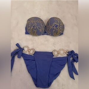 This stunning Beach Bunny Bronze Blue Bikini Swimsuit